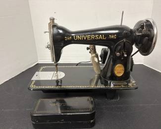 Universal Deluxe Sewing Machine