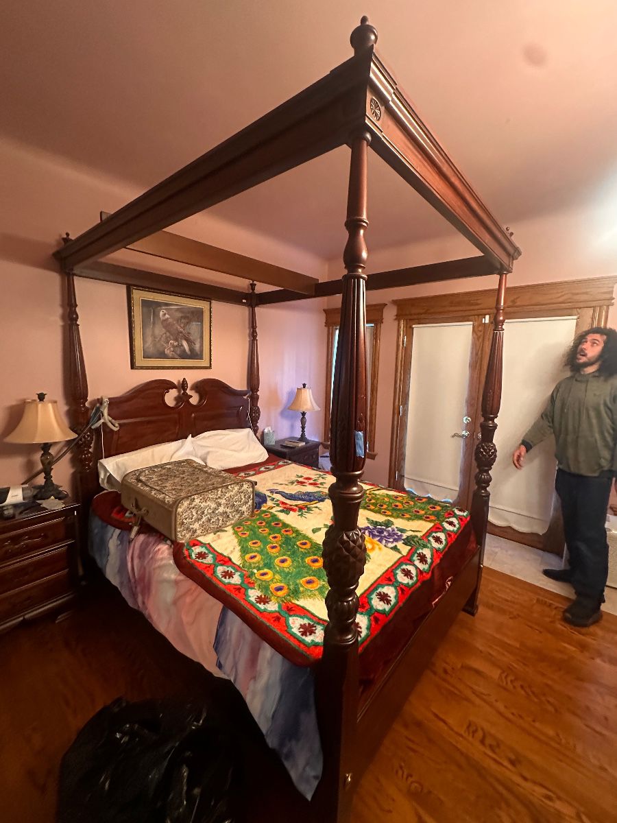 Four poster queen-size bed