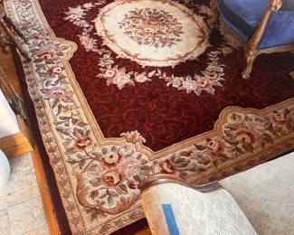Red floral area rug