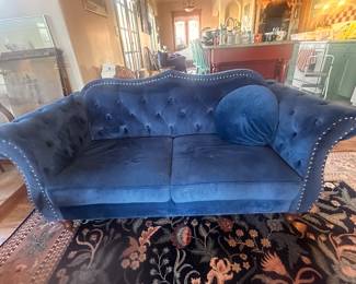 Blue velvet sofa