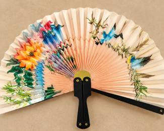 Floral & Bird Folding Fan — Peach and ivory pleated fan with colorful birds, flowers, and black handle.