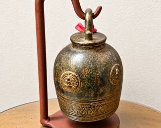 Decorative Vintage-Style Metal Bell ◆ Ornate embossed designs ◆ Aged bronze-tone finish ◆ Curved metal display stand