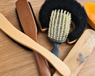 Assorted Vintage Clothing & Grooming Brushes ◆ Wood handles in natural and dark finishes ◆ Black and light-colored bristles ◆ Various shapes and sizes ◆ Mixed condition