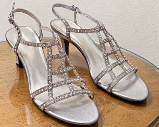 Silver Metallic Strappy Heeled Sandals ◆ Rhinestone-studded cage design ◆ Open toes ◆ Adjustable ankle straps ◆ Low heels