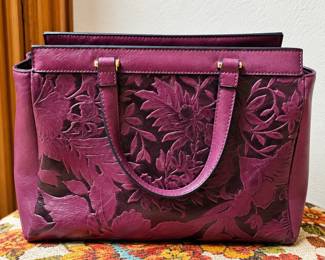 Plum Purple Floral-Embossed Tote Handbag ◆ Structured design ◆ Raised floral pattern ◆ Double shoulder handles ◆ Gold-tone hardware ◆ Spacious interior