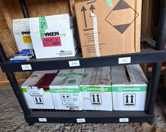 Assorted boxed adhesive and shop supplies