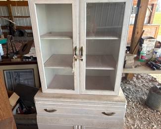 White glass-front hutch cabinet