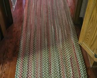 Many rugs various sizes