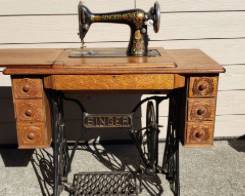 Singer 66-16 Treadle Sewing Machine with Oak Table