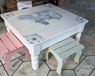 Nautical-themed coffee table with matching stools