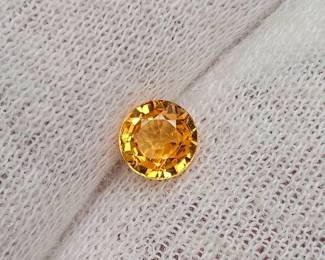 0.76 Carat Natural Golden Orange Garnet Round Cut