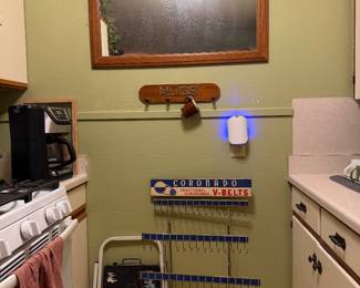 Mirror (one of many), Mechanical ephemera (V Belt display rack), MCM mug holder 