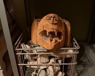 Metal milk crates, bones, hand carved bear head