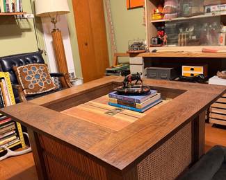 Custom one of a kind coffee table, so many tchotchkes 