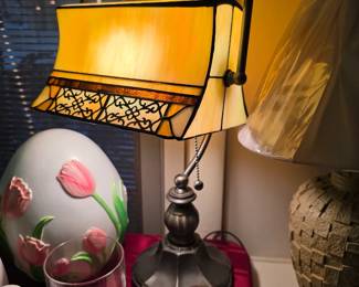 Tiffany-style stained glass banker's desk lamp with a bronze-toned metal base