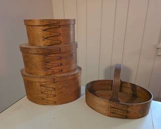 Shaker-style oval bentwood pantry boxes and a bentwood carrier basket