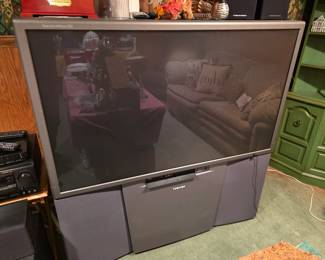 Toshiba TheaterWide HD rear-projection CRT television set with a massive screen and built-in front-facing speakers.
