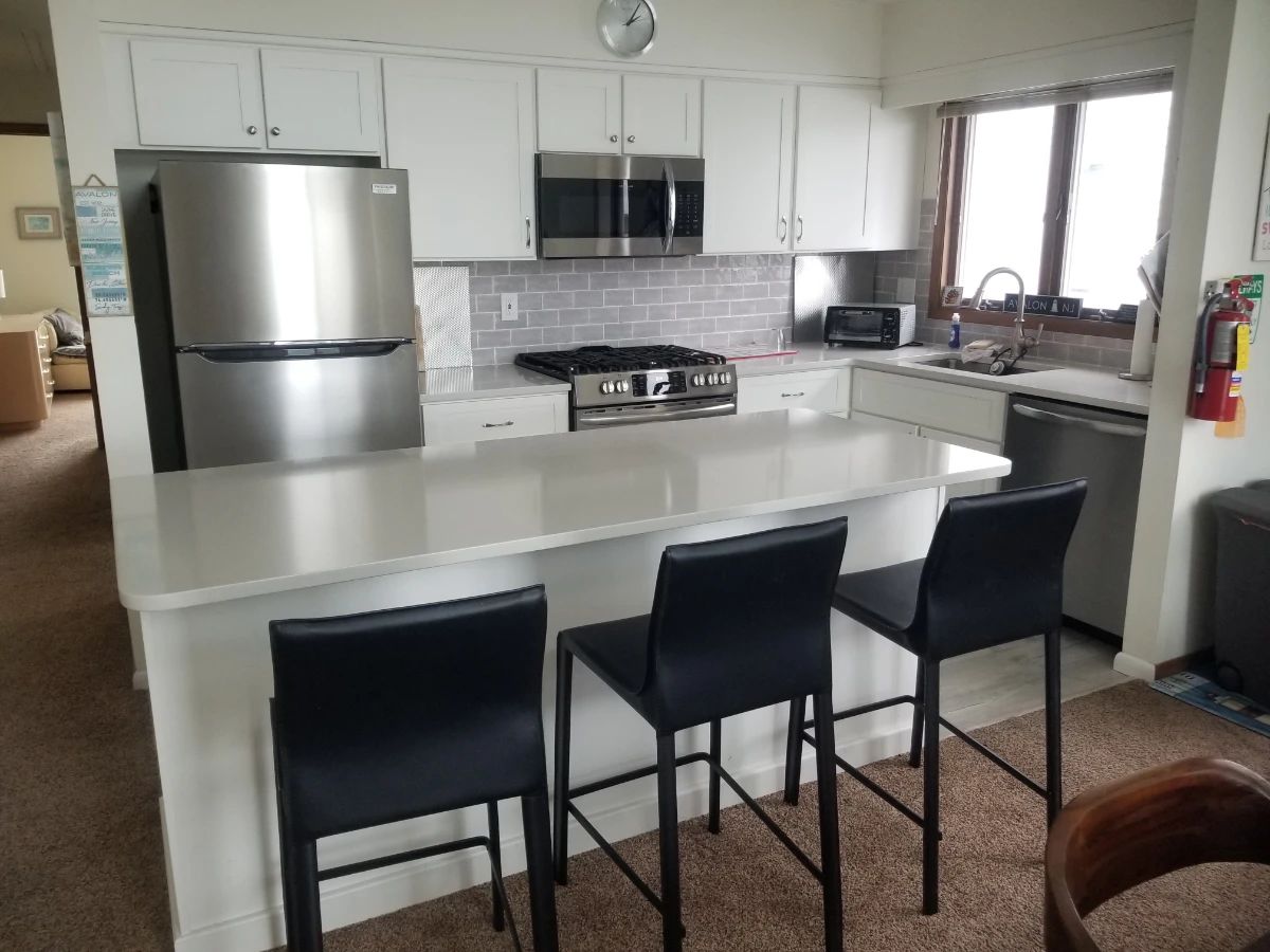Nicely updated kitchen is crisp white