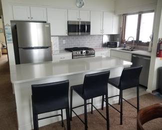 Nicely updated kitchen is crisp white