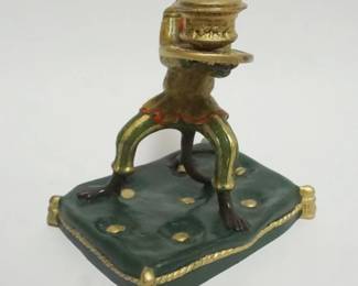 1033 CAST METAL HAND PAINTED MONKEY ON PILLOW CANDLESTICK, APPROXIMATELY 6 IN X 5 IN X 8 IN HIGH