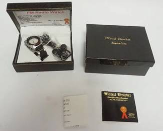 1054 MARCEL DRUCKER SIGNATURE VINTAGE FM RADIO WRISTWATCH IN BOX, UNUSED