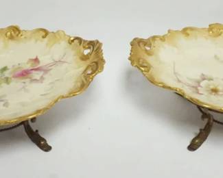 1027 OVAL CHINA DISHES W/FLORAL DECORATIONS & GILT EDGES ON METAL STAND W/DOLPHIN FEET, EACH APPROXIMATELY 11 IN X 9 IN X 4 IN HIGH