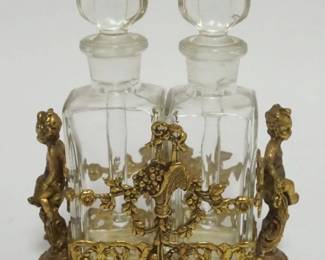 1003 GLASS PERFUME BOTTLES W/DABBERS IN ORNATE GILT METAL HOLDERS W/CHERUBS, APPROXIMATELY 4 IN X 1 1/2 IN X 5 IN HIGH