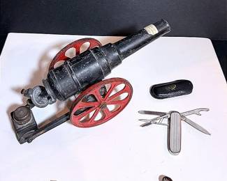 Big Bang Carbide Cast Iron Toy Cannon, Victorinox Pocket Knife And Malaysian Silver Cufflinks