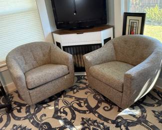 Pair if swivel/rocker/glider chairs in neutral colors