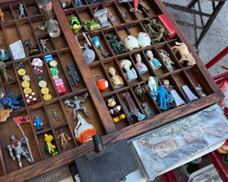 Eclectic Collection of Vintage Miniatures, Toys & Collectibles A fascinating assortment of vintage and antique miniature treasures, displayed in beautiful wooden compartmentalized printer’s trays. Collection includes miniature figurines, vintage toys, military soldiers, knights, Disney characters, porcelain figures, miniature vehicles, airplanes, trains, dice, advertising novelties, souvenir collectibles, decorative objects, and unusual curiosities. An eclectic mix of metal, wood, porcelain, ceramic, glass, and plastic pieces spanning different eras and styles. Perfect for collectors, antique enthusiasts, artists, miniature lovers, and anyone who appreciates unusual, nostalgic, and one-of-a-kind finds!