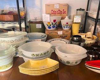 Blue Snowflake Pyrex Mixing Bowls, Corelle Plates, Avacado CrockPot, *RARE* 1940s Tulip Mixing Bowls, Various Fire King Dishes, Silver Mercury Glass Ice Bucket & Tumblers, MCM Glasses, MCM Blender, Chip & Dip Set, Salad Set
