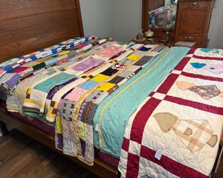 Wonderful Quilts.  Pictured here are 7 quilts in excellent condition featuring Sun Bonnet Girl