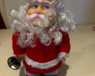1970's Vintage Walking Bell Ringer Santa.  Needs batteries.  right foot back tread missing