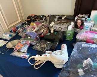 Grooming tools and supplies, lotions, mirrors, cosmetic bags, rollers
