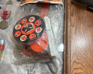 In original bag - never opened - vintage tin lithograph Halloween spinning toy and noisemaker with a black cat, owl, and pumpkin design - produced in  US by the U.S. Metal Toy Manufacturing Co