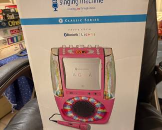 Our toy and game room is full. Singing Machine