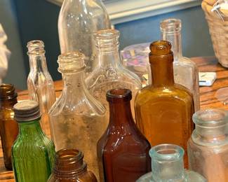 Vintage bottles, clear, amber,blue and green