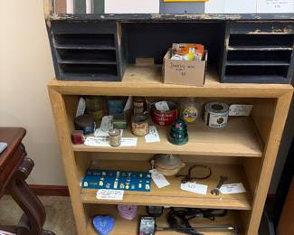 Key, lax typewriter ribbon tin, Pacific hand soap tin, 1996 Atlanta Olympics, the sponsor Lapelle, Pin collection, Desk lamp and Bookcase.