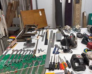 Set of Allied open closed wrenches, vintage clamps, yard sticks and irons.