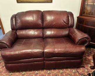 Leather reclining loveseat