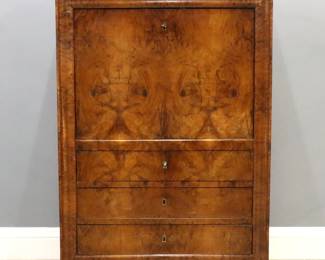 An early to mid 19th century French Secretaire Abattant.  Burled Walnut construction features a molded top over a single long drawer, over a drop front that opens to reveal a fitted Bird's Eye Maple interior with multiple concealed compartments, over three long drawers on a molded base with bracket feet.  Old finish with minor wear, shrinkage, crack to top, minor losses to veneer.  40 x 18 3/4 x 61" high overall.  