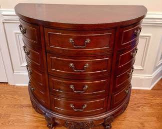 Demilune Chest with Brass Hardware...Scrolled Feet with Half Shell Motif