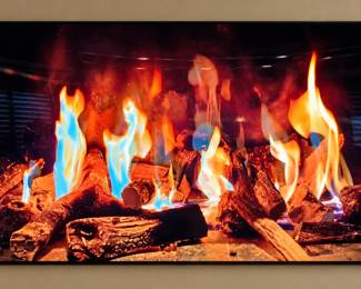 76 inch beautiful TV...Just in time for the Holidays when you don't have a fireplace! Make your home look warm and cozy with a TV fire!