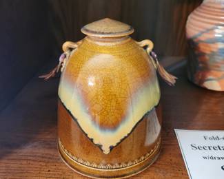 Pottery jar with handles