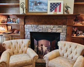 Pair of upholstered armchairs by The Charles Stewart Co