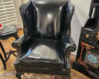 Black patent leather armchair