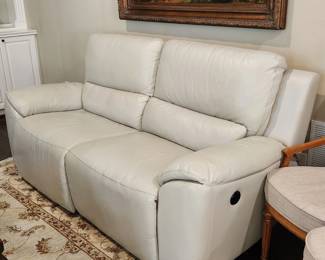 White leather reclining loveseat