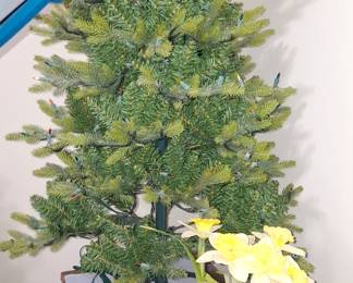 several artificial christmas trees