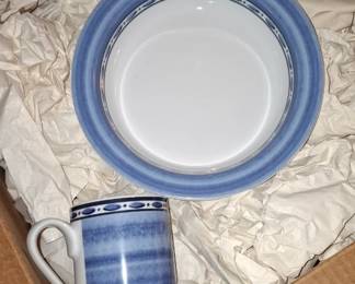 box of blue and white pottery never used dishware