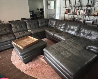 Signature Design by Ashley Brindley Pier leather sectional with ottoman